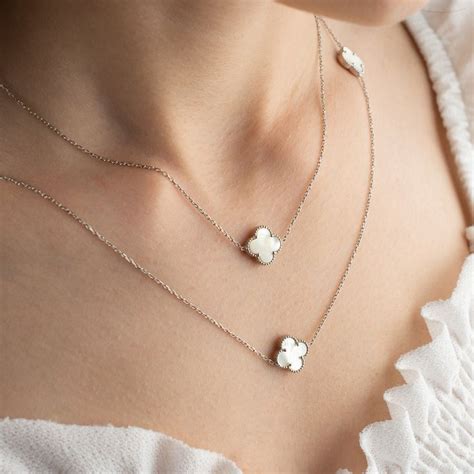 van cleef dior clover necklace|clover shape necklace designer name.